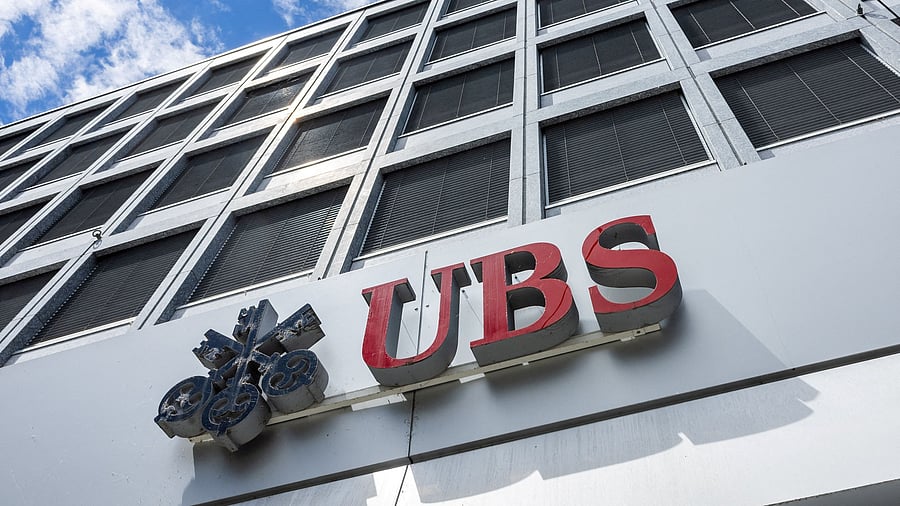 <div class="paragraphs"><p>FILE PHOTO: A UBS logo is pictured on the branch of the Swiss bank in Lucerne, Switzerland</p></div>