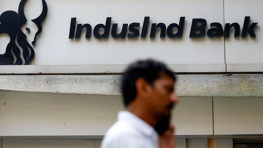 <div class="paragraphs"><p>A man walks outside a branch of IndusInd Bank in New Delhi, India</p></div>