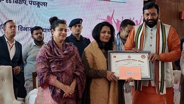 <div class="paragraphs"><p>Haryana Chief Minister Nayab Singh Saini felicitates Rekha Rani Dhiman at a Women's Day function on March 9. Haryana’s irrigation minister Shruti Choudhry can also be seen in the picture</p></div>
