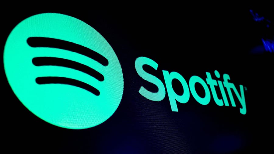 <div class="paragraphs"><p>A screen displays the logo of Spotify.</p></div>