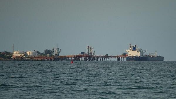 <div class="paragraphs"><p>A tanker carrying barrels of Russian fuel oil</p></div>