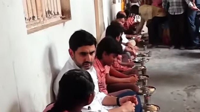 <div class="paragraphs"><p>Screengrab of Andhra Minister Nara Lokesh  partaking a mid-day meal with&nbsp;government junior college students.</p></div>