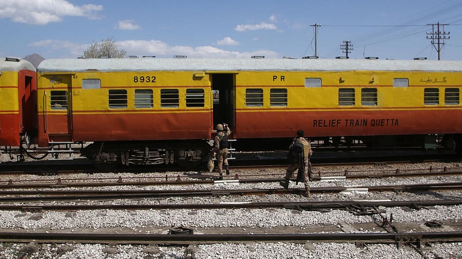 <div class="paragraphs"><p>Soldiers board a relief train headed to Bolan, where a passenger train was attacked by separatist militants. </p></div>