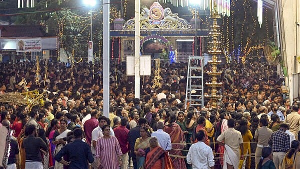 <div class="paragraphs"><p>Devotees throng the Attukal Bhagavathy temple during the 'Attukal Pongala' festival, in Thiruvananthapuram,</p></div>