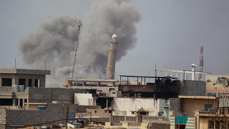 <div class="paragraphs"><p>A view of the Al-Hadba minaret of the Great Mosque of al-Nuri, during the battles to liberate the city of Mosul and before it was blown up by Islamic State militants, in Mosul, Iraq.</p></div>