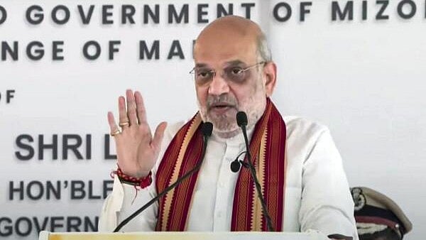 <div class="paragraphs"><p>Union Home Minsiter Amit Shah speaks at the land transfer ceremony between Assam Rifles & Govt of Mizoram, in Aizawl. </p></div>
