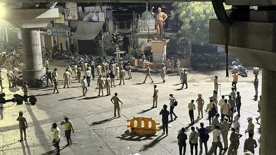 <div class="paragraphs"><p>Police disperse an agitating crowd following communal tension in Nagpur on March 17.&nbsp;</p></div>