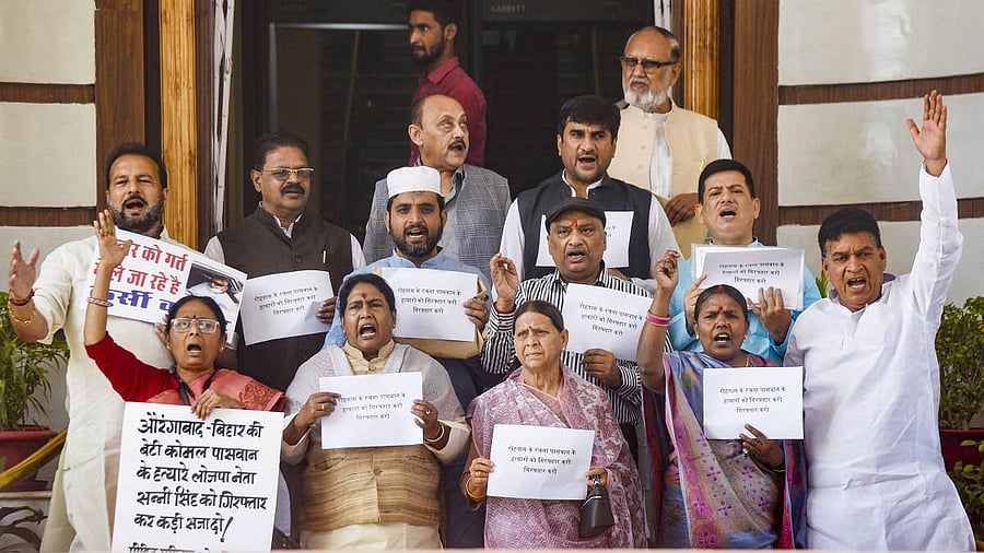 <div class="paragraphs"><p>Former Bihar CM Rabri Devi and RJD leaders stage a protest against the Bihar Government during the Budget session.</p></div>