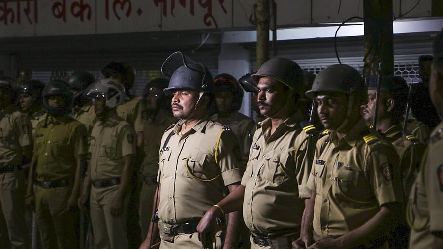 <div class="paragraphs"><p>Police in Nagpur following violence there.</p></div>