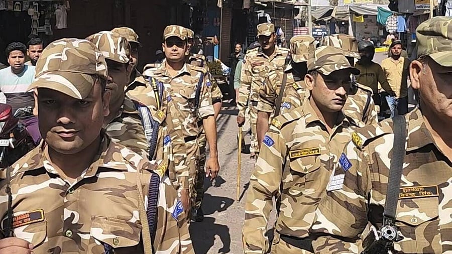 <div class="paragraphs"><p>Security personnel conduct a flag march in view of protests over administration's restrictions on century-old Neja mela, in Sambhal.</p></div>
