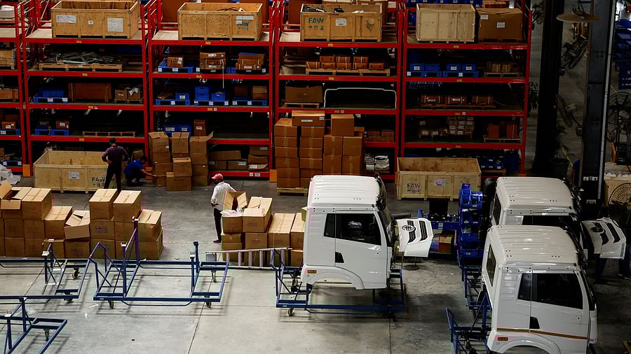 <div class="paragraphs"><p>FILE PHOTO: Employees work at the Blue Energy liquefied natural gas (LNG) truck manufacturing facility in Pune, India, October 11, 2024. </p></div>
