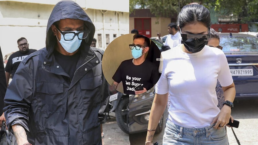 <div class="paragraphs"><p>Yuzvendra Chahal and Dhanashree Verma in court with an inset image showing the cricketer's tee-shirt which reads 'Be your own sugar daddy'.</p></div>