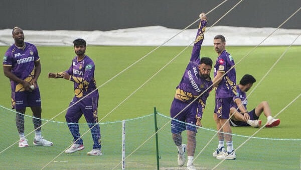<div class="paragraphs"><p>Kolkata Knight Riders' player Varun Chakravarthy bowls during a training session ahead of the Indian Premier League (IPL) 2025 cricket tournament, at Eden Gardens in Kolkata, West Bengal, Thursday, March 20, 2025.</p></div>