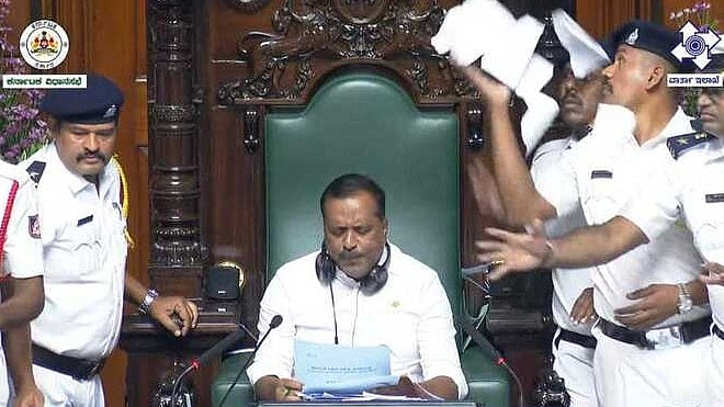 <div class="paragraphs"><p>The MLAs are seen hurling papers torn out of Siddaramaiah’s 2025-26 Budget and other documents at Speaker UT Khader’s chair.&nbsp;</p></div>