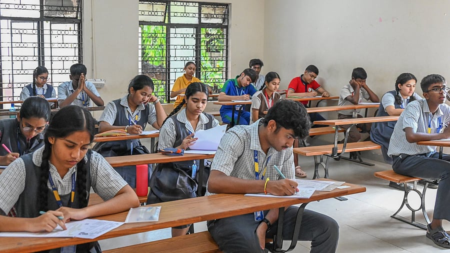 <div class="paragraphs"><p>Students appear for the first language examination at the Karnataka Public School examination centre at Malleswaram in Bengaluru on Friday. </p></div>