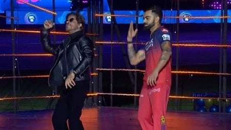 <div class="paragraphs"><p>Shah Rukh Khan and Virat Kohli groove together.</p></div>