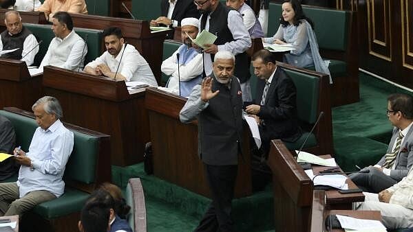 <div class="paragraphs"><p> BJP MLA Sham Lal Sharma and others in the J&amp;K Assembly.</p></div>