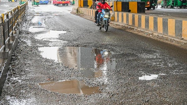 <div class="paragraphs"><p>Representative image showing potholes on the road.</p></div>