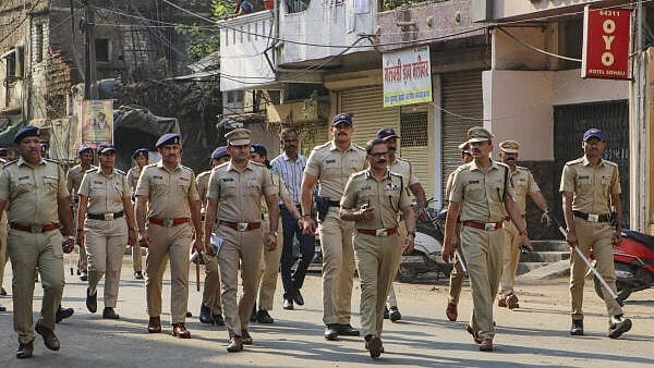 <div class="paragraphs"><p>Nagpur Commissioner of Police Ravinder Singal with other police personnel reviews the law and order situation</p></div>