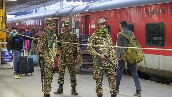 <div class="paragraphs"><p>Security personnel stand guard at the New Delhi Railway Station, in New Delhi. </p></div>