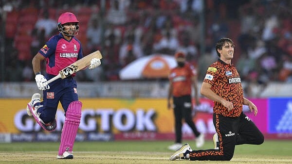 <div class="paragraphs"><p>Rajasthan Royals batter Dhruv Jurel runs between the wickets as Sunrisers Hyderabad's Pat Cummins looks at the ball during the IPL 2025 match between Sunrisers Hyderabad and Rajasthan Royals at Rajiv Gandhi International Cricket Stadium, in Hyderabad, Sunday, March 23, 2025.</p></div>