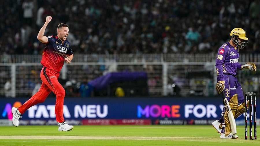 <div class="paragraphs"><p>Royal Challengers Bengaluru's Josh Hazlewood celebrates after the dismissal of Kolkata Knight Riders' Quinton de Kock.</p></div>