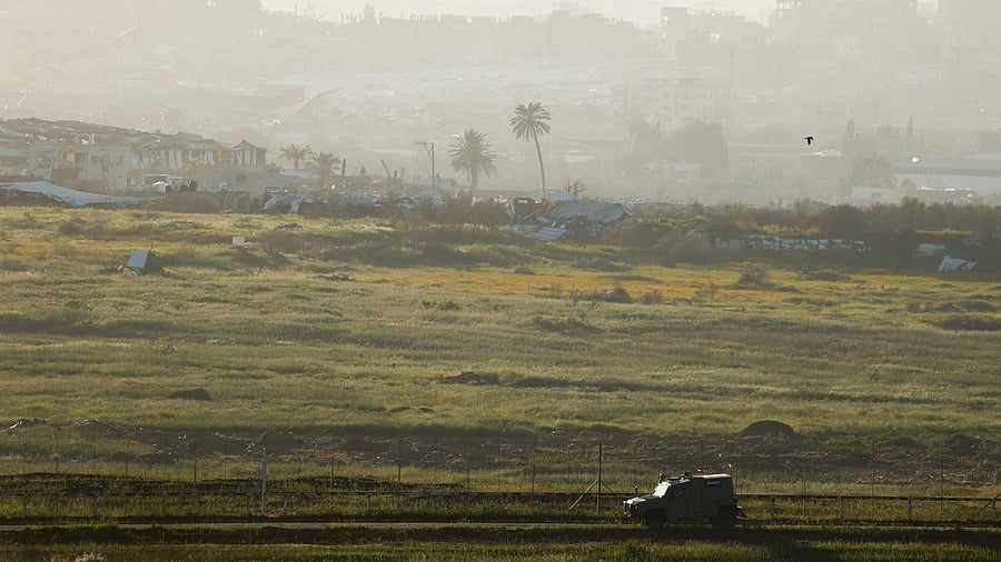 <div class="paragraphs"><p>A military Jeep patrols along the Israeli side of the Gaza-Israel border, March 19, 2025.</p></div>