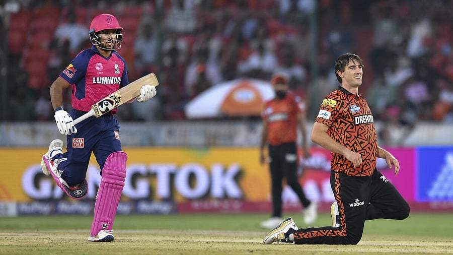 <div class="paragraphs"><p>Rajasthan Royals batter Dhruv Jurel runs between the wickets as Sunrisers Hyderabad's Pat Cummins looks at the ball during the IPL 2025 match between Sunrisers Hyderabad and Rajasthan Royals at Rajiv Gandhi International Cricket Stadium, in Hyderabad, Sunday, March 23, 2025.</p></div>