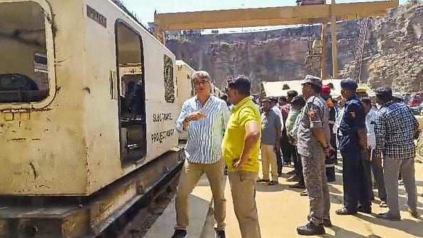 <div class="paragraphs"><p>Rescue operation underway to trace workers trapped inside the partially collapsed Srisailam Left Bank Canal (SLBC) project tunnel, in Nagarkurnool, Telangana.&nbsp;</p></div>