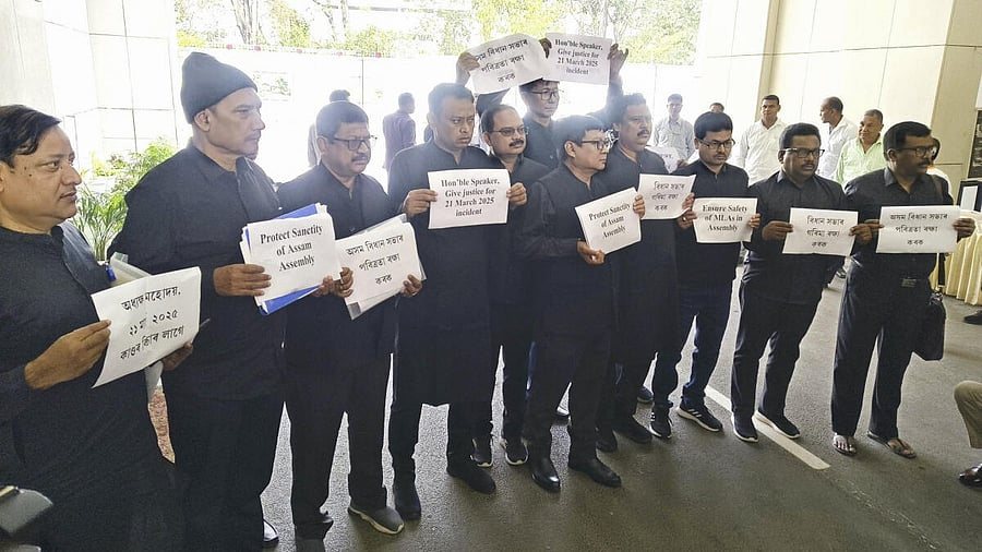 <div class="paragraphs"><p>Congress legislators wearing black clothes stage a protest during the Budget session of Assam Assembly in Guwahati. </p></div>