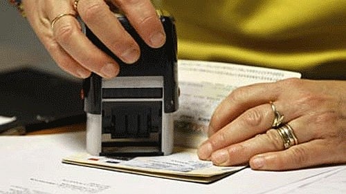 <div class="paragraphs"><p>Passport getting stamped. Representative image.</p></div><div class="paragraphs"><p><br></p></div>