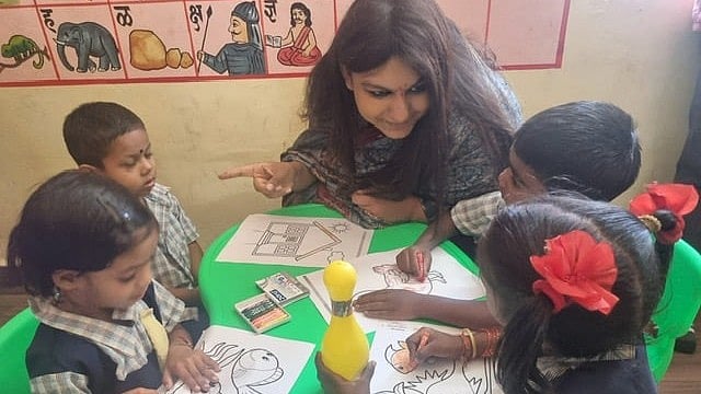 <div class="paragraphs"><p>Priya Agarwal Hebbar engaging with the kids at Nand Ghar in Thane.</p></div>