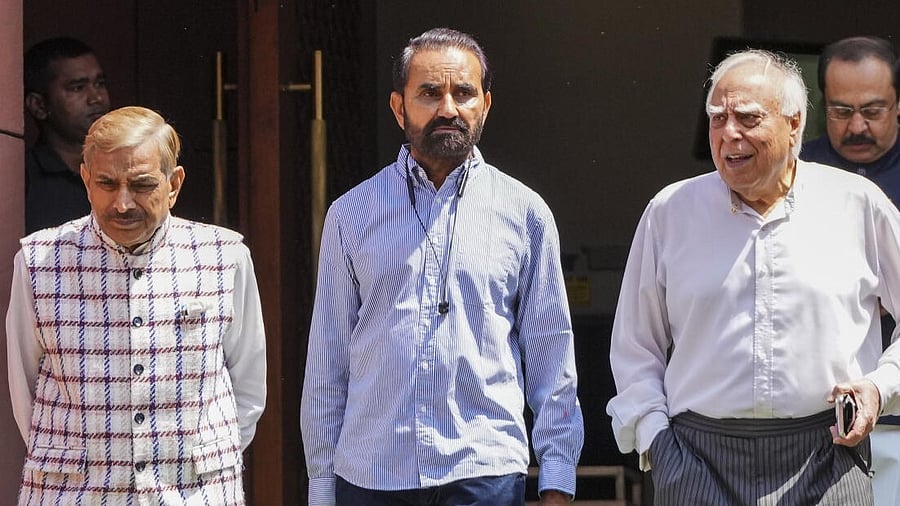 <div class="paragraphs"><p>Rajya Sabha MPs Pramod Tiwari, Shaktisinh Gohil and Kapil Sibal during the Budget session of Parliament, in New Delhi.</p></div>