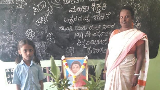 Manasa with teacher Padmakka.