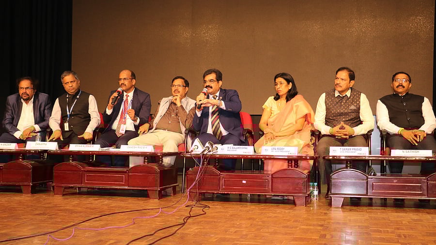 Members of different industry bodies under aegis of FKCCI speaking to media in Bengaluru on Wednesday