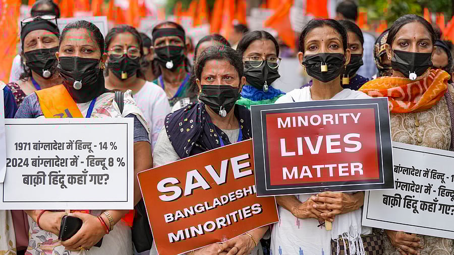 <div class="paragraphs"><p>Protest over violence against minorities in Bangladesh erupted in India after former PM Sheikh Hasina fled the country</p></div>