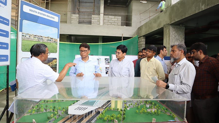 <div class="paragraphs"><p>SWR General Manager Mukul Saran Mathur (second from left) reviews station redevelopment projects in Bengaluru on Wednesday. </p></div>