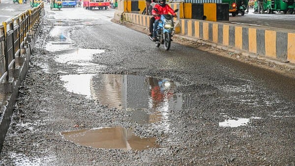 <div class="paragraphs"><p>File photo showing Peenya to Jalahalli Road.</p></div>