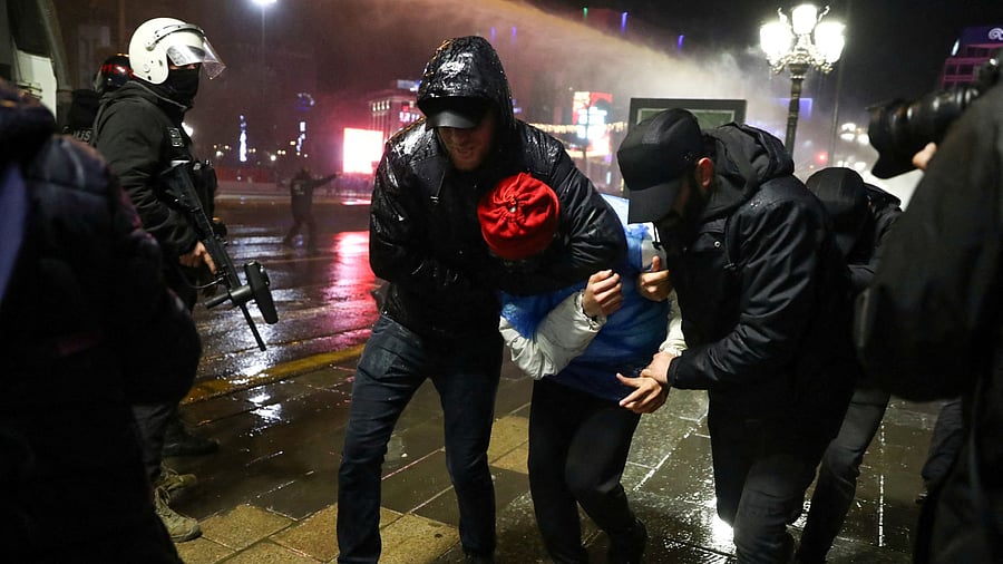 <div class="paragraphs"><p>Police officers detain a demonstrator during a protest on the day Istanbul Mayor Ekrem Imamoglu was jailed as part of a corruption investigation, in Ankara, Turkey, March 23, 2025. </p></div>
