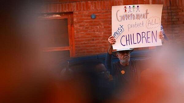 <div class="paragraphs"><p>People take part in a protest against President Donald Trump's immigration policies in El Paso.</p></div>