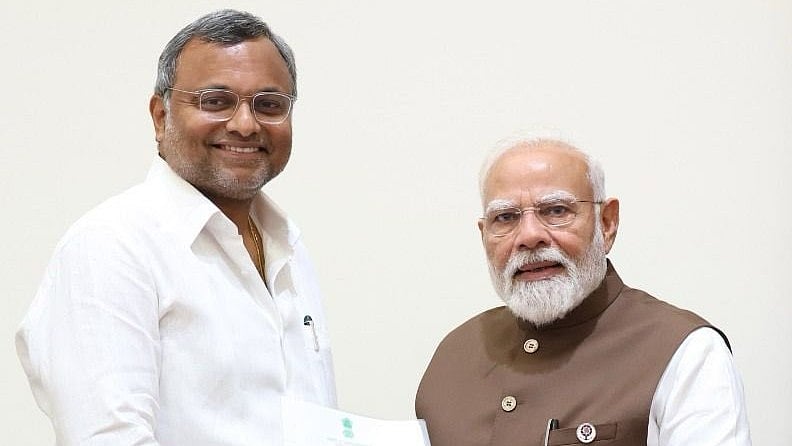 <div class="paragraphs"><p>Congress's Karti Chidambaram meets PM Modi.</p></div>