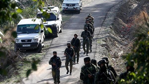 <div class="paragraphs"><p>ndian security force personnel patrol near the site of a gun battle with suspected militants in a forest area in Kathua district of Jammu and Kashmir, March 28, 2025.</p></div>