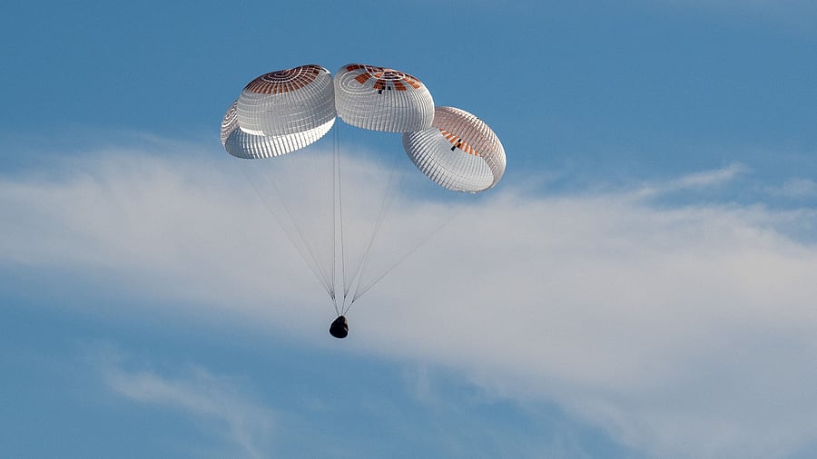 <div class="paragraphs"><p>A SpaceX Dragon spacecraft is seen as it lands with NASA astronauts Nick Hague, Suni Williams, Butch Wilmore, and Roscosmos cosmonaut Aleksandr Gorbunov aboard in the water </p></div>