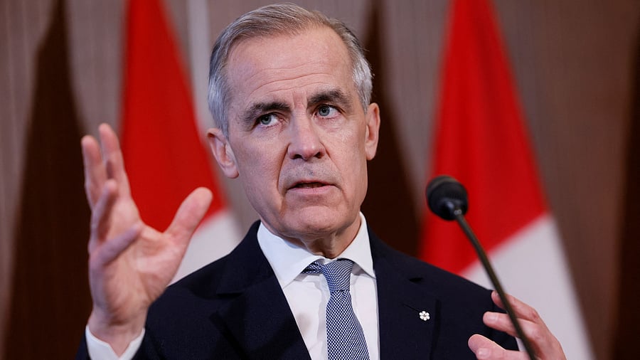 <div class="paragraphs"><p>Canada's Prime Minister Mark Carney takes</p></div>