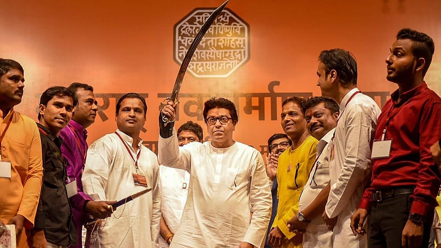 <div class="paragraphs"><p>Maharashtra Navnirman Sena (MNS) Chief Raj Thackeray (C) during the 14th Foundation Day celebration of MNS Party</p></div>