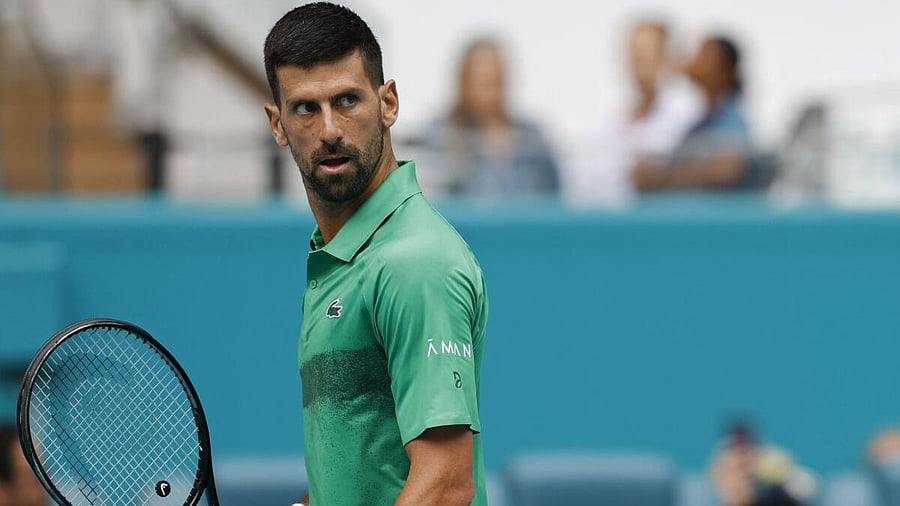 <div class="paragraphs"><p>Novak Djokovic (SRB) reacts after winning a game against Grigor Dmitrov (BUL) in a men's singles semifinal on day eleven of the Miami Open at Hard Rock Stadium.</p></div>