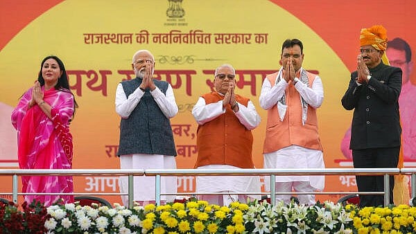 <div class="paragraphs"><p>rime Minister Narendra Modi with Rajasthan Governor Kalraj Mishra, CM-designate Bhajan Lal Sharma and his deputies Diya Kumari and Prem Chand Bairwa during the swearing-in ceremony of the Chief Minister, in Jaipur</p></div>