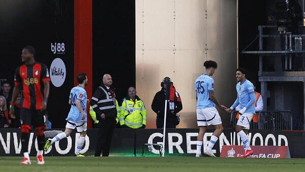 <div class="paragraphs"><p>Manchester City's Omar Marmoush celebrates scoring their second goal with Nico O'Reilly.</p></div>