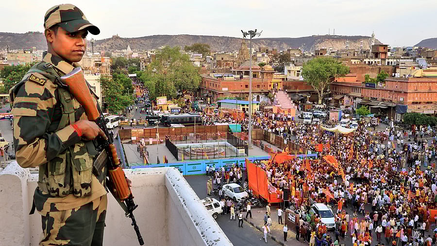 <div class="paragraphs"><p>A security personnel stands guard during a festival procession. Representative image.</p></div>