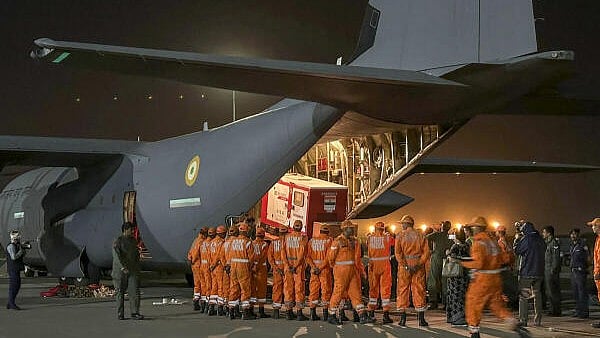 <div class="paragraphs"><p>NDRF personnel prepare to leave with relief materials for the earthquake-hit people of Myanmar, at the Hindon Airport in Ghaziabad, Saturday, March 29, 2025.</p></div>